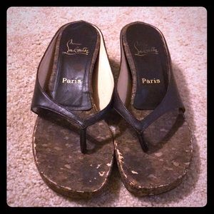 Christian Louboutin slides.